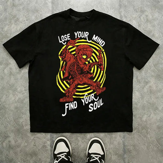 Best-selling men’s graphic T-shirt featuring a bold slogan paired with a psychedelic skull and guitar hand graphic; an emotional rock street style. Men’s casual streetwear T-shirt suitable for music festivals, underground shows, and urban exploration, ble
