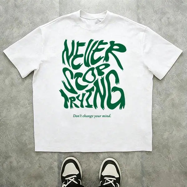 Men’s 100%25 cotton loose-fit T-shirt with an inspirational slogan graphic and graffiti-style lettering; urban street style, relaxed casual short sleeves. 2025 TikTok trend—urban streetwear. A steal at under $10., Love, Top, Shortsleeve, Tshirt tiktokshop