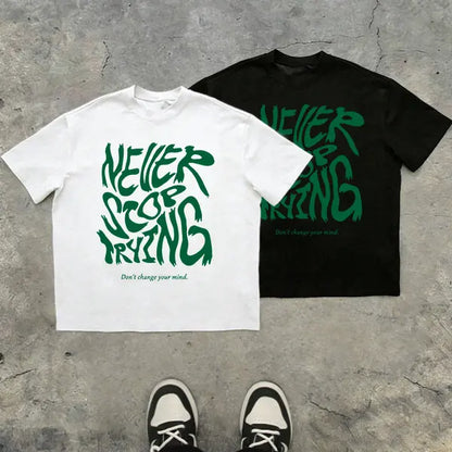 Men’s 100%25 cotton loose-fit T-shirt with an inspirational slogan graphic and graffiti-style lettering; urban street style, relaxed casual short sleeves. 2025 TikTok trend—urban streetwear. A steal at under $10., Love, Top, Shortsleeve, Tshirt tiktokshop