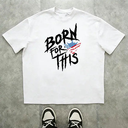 Men’s summer 100%25 cotton loose streetwear T-shirt, “Born for This” American flag skull graphic crew neck tee, edgy patriotic distressed short-sleeve top for everyday urban casual outfits