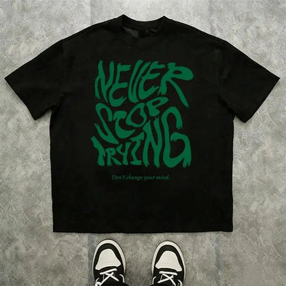 Men’s 100%25 cotton loose-fit T-shirt with an inspirational slogan graphic and graffiti-style lettering; urban street style, relaxed casual short sleeves. 2025 TikTok trend—urban streetwear. A steal at under $10., Love, Top, Shortsleeve, Tshirt tiktokshop