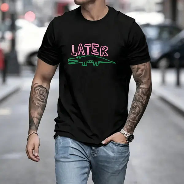 Men’s “Later” crocodile graphic T-shirt featuring playful pink text and a green alligator print, made from a soft cotton blend—perfect for casual style enthusiasts, animal print fans, and everyday relaxed outfits.